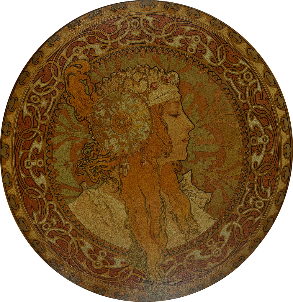 DAPRÈS ALPHONSE MUCHA (1860-1939). [TÊTES BYZANTINES.] Two decorative metal plates. Circa 1900. Each with a diameter of 16 inches, 40